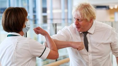 Britain's Prime Minister Boris Johnson meets with medical staff during a visit to Hexham General Hospital in Hexham, Britain, November 8, 2021. Peter Summers/Pool via REUTERS